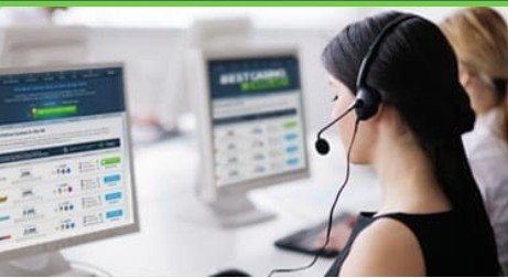 Customer service agents at computers